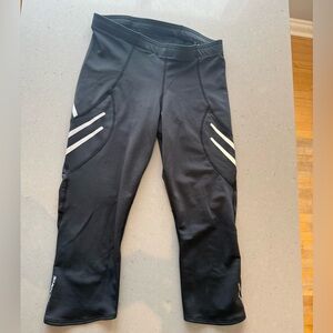 SUGOI cropped Black insulated running Leggings with White Accents
